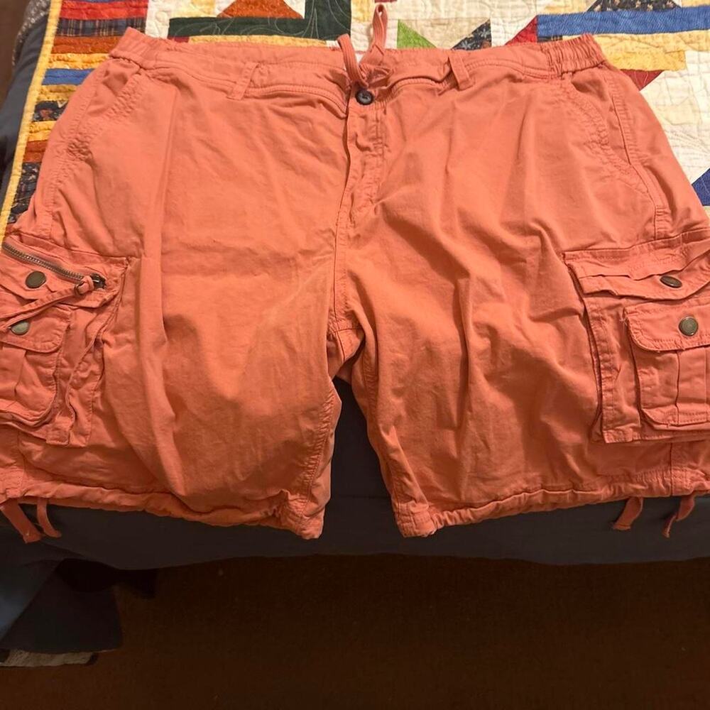 Orange cargo shorts with adjustable